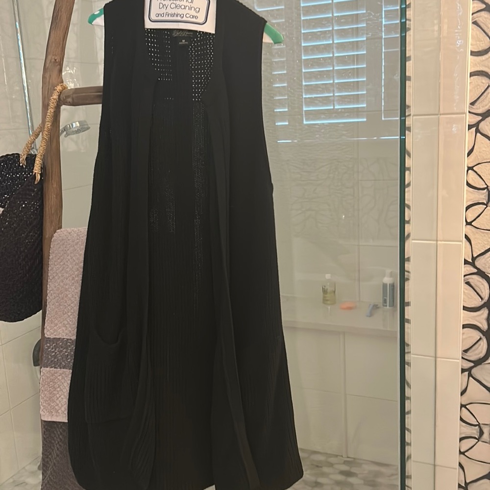 Lucky Brand black knit sweater vest. Size medium. Great condition. 2 pockets.